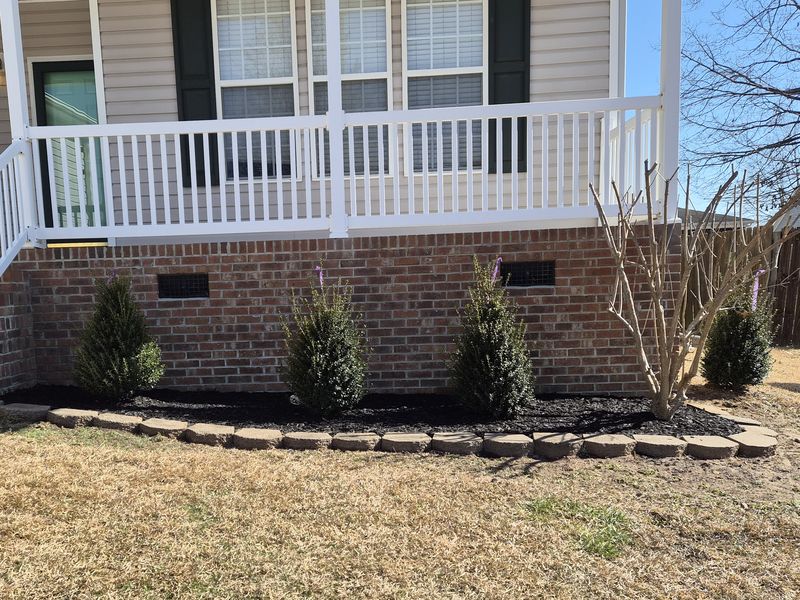 Front porch bed after bed refresh and planting by Good Life Landscapes